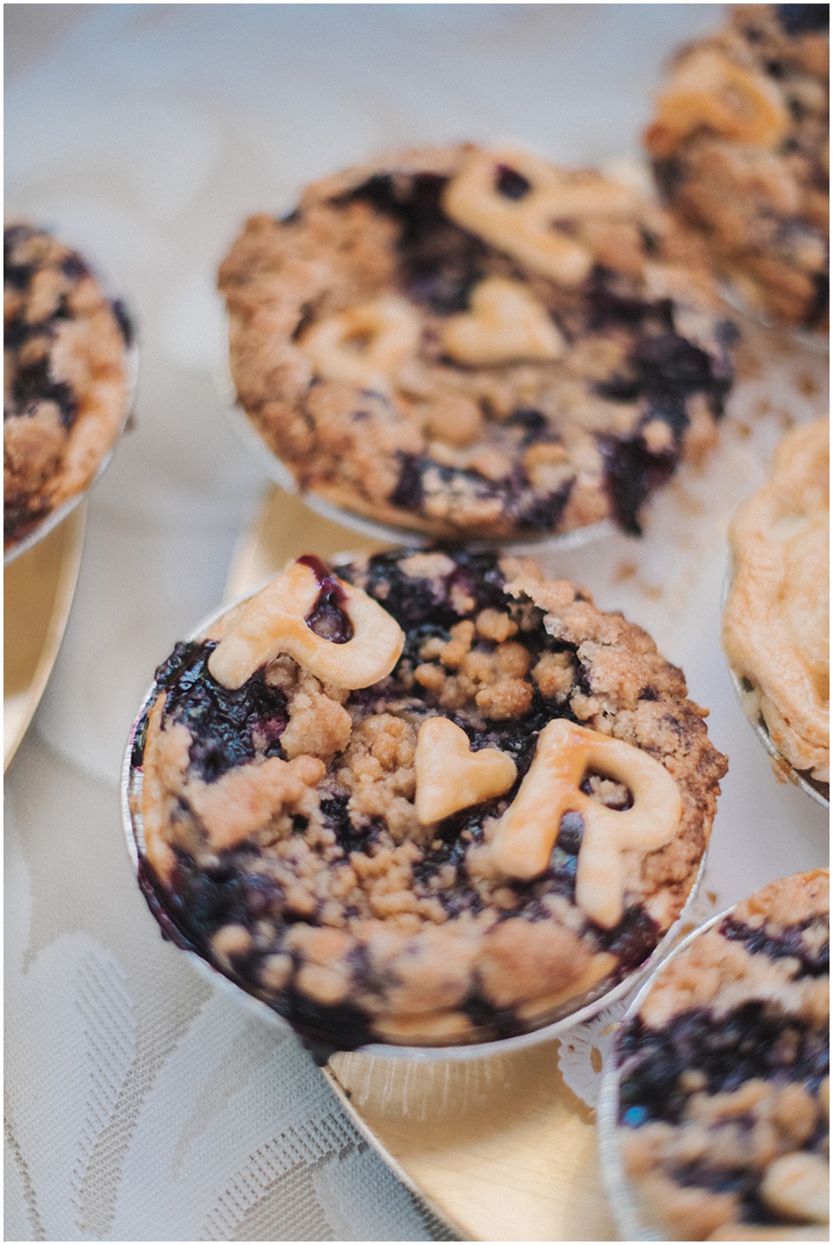 Individual mini pies personalized with letters at a Palm Beach wedding