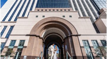 Couple outside the Palm Beach County Courthouse after getting married