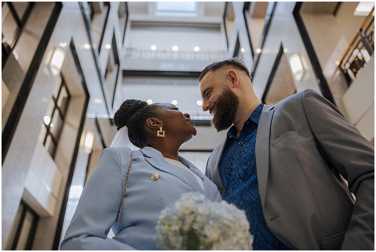 Newlywed couple showing their wedding rings after their Palm Beach County wedding