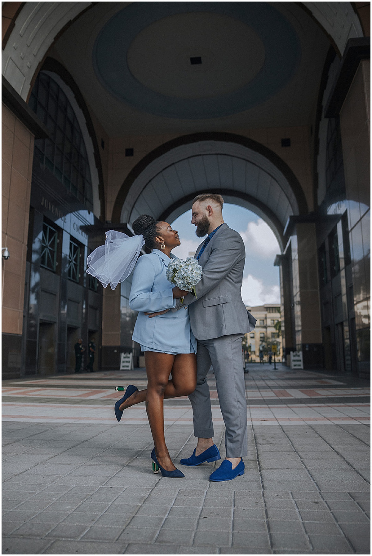 Newlywed couple outside the Palm Beach County courthouse in West Palm Beach