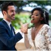 Palm Beach wedding couple sharing a cake pop as an alternative to wedding cake